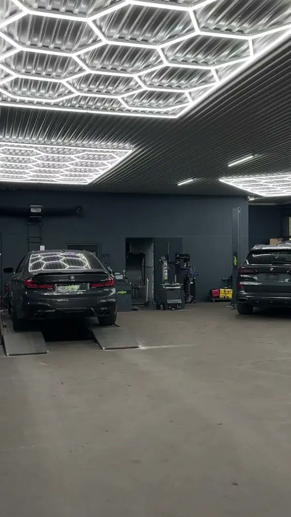 Car on a lift at Pulsecar workshop