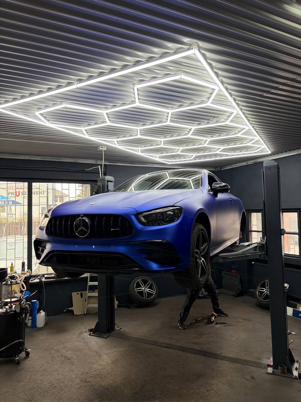 Blue Mercedes AMG with neon